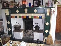 The hearth has been restored and decorations throughout mirror the theme of Ireland of the 1950&amp;#039;s at Yvonne&amp;#039;s Cottage.